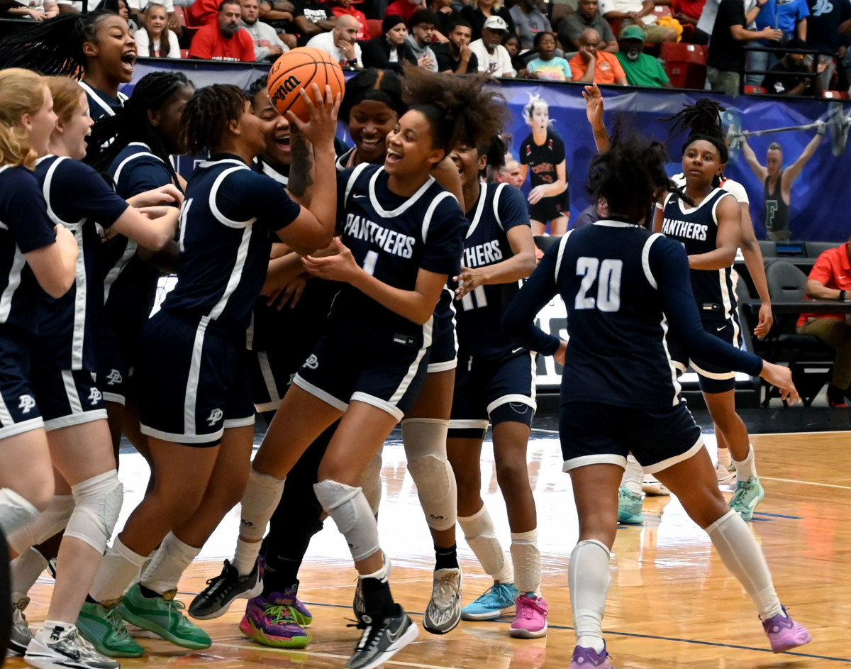 Orlando Dr. Phillips players celebrate after three-peating as the FHSAA Class 7A state champions on Saturday at The RP Funding Center.